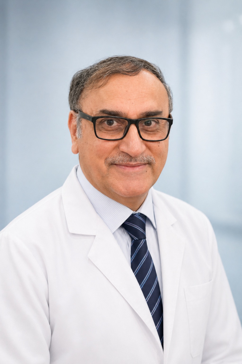 Dr. Harwinder Baweja